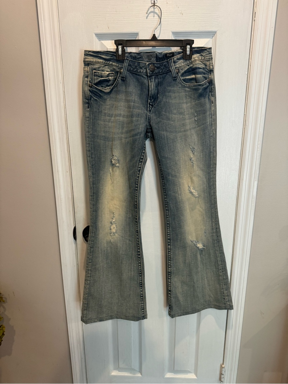 Women’s Distressed flare jeans